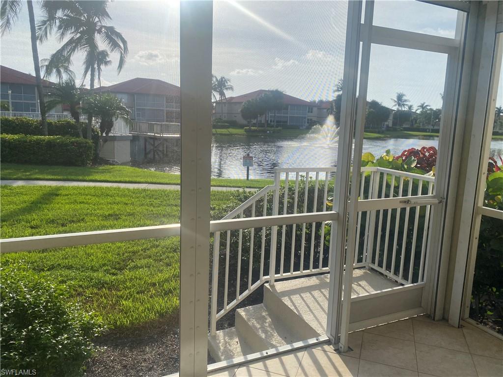 295 Waterside Circle, Unit 1102 Marco Island, FL 34145 - Photo 25 of 31 a view of a balcony with a yard