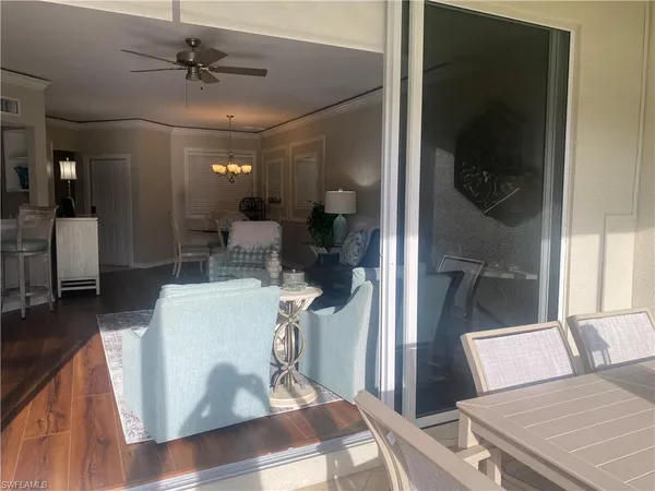 a view of a livingroom with furniture and window
