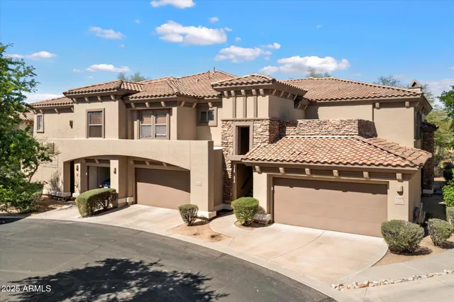 a front view of a house with a ocean view
