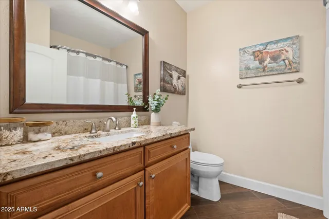 a view of a swimming pool with outdoor seating