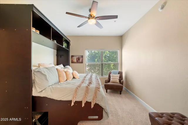 a view of a swimming pool with outdoor seating