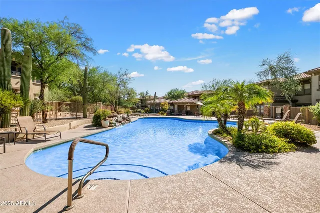 a view of a swimming pool and outside space