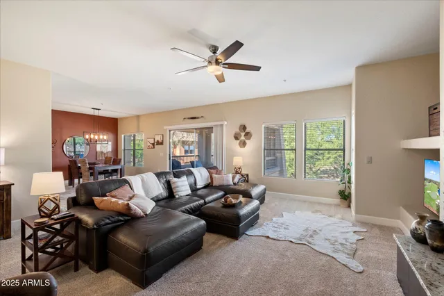 a kitchen with a refrigerator a sink a stove a microwave and cabinets