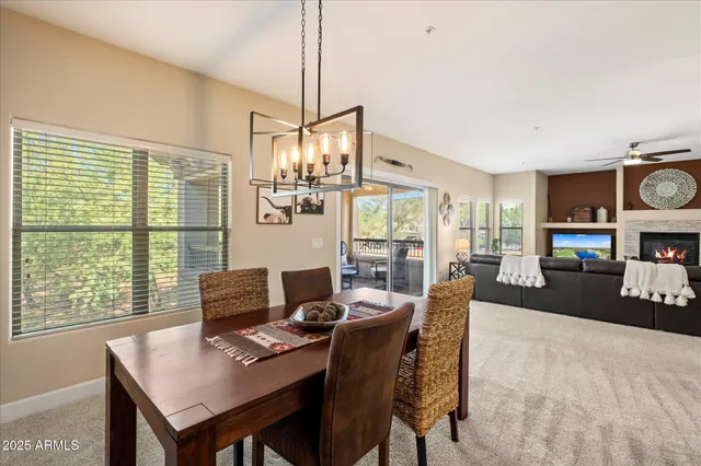 a bedroom with a bed and a television