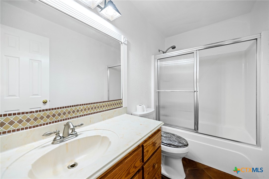 601 7 Ranch Road Salado, TX 76571 - Photo 32 of 44 a bathroom with a sink toilet and shower