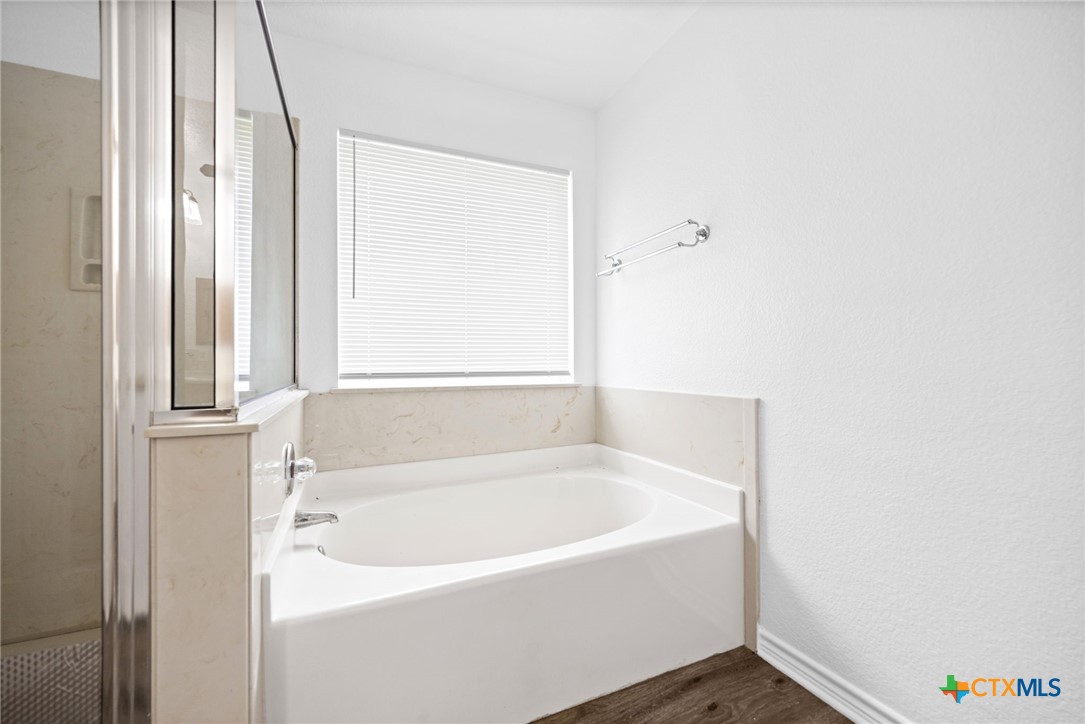 601 7 Ranch Road Salado, TX 76571 - Photo 43 of 44 a white bath tub sitting next to a window