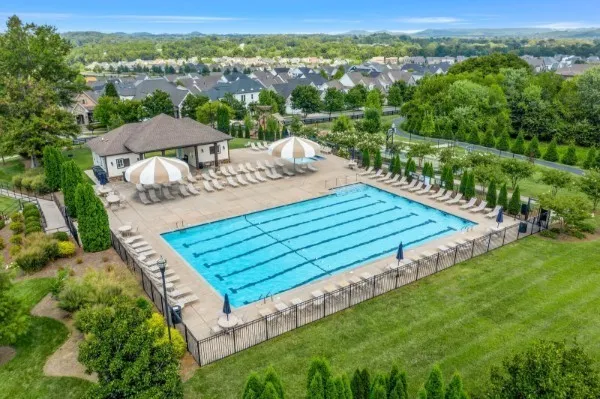 view of a wooden deck and a yard
