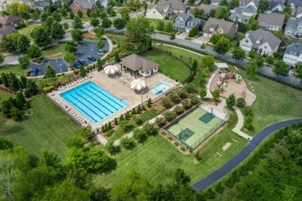 an aerial view of a house with outdoor space