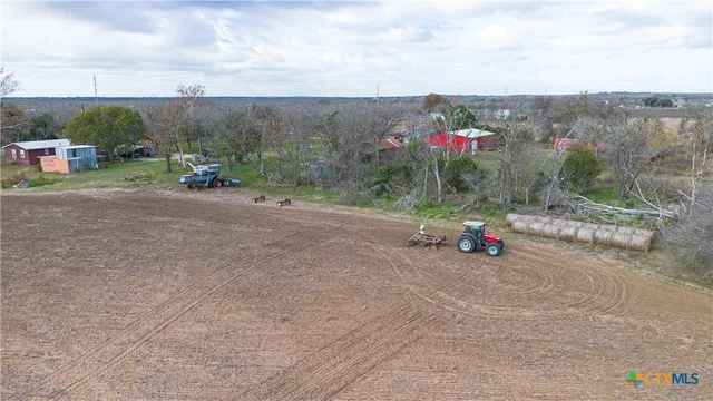 an aerial view of mountain with lake view