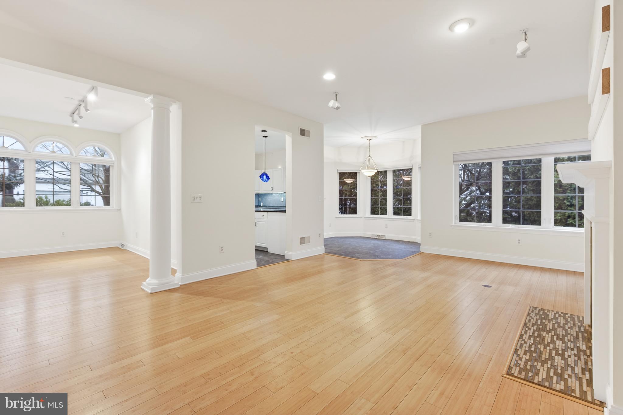 701 Woodfield Drive Lititz, PA 17543 - Photo 12 of 45 a view of an empty room with window and wooden floor