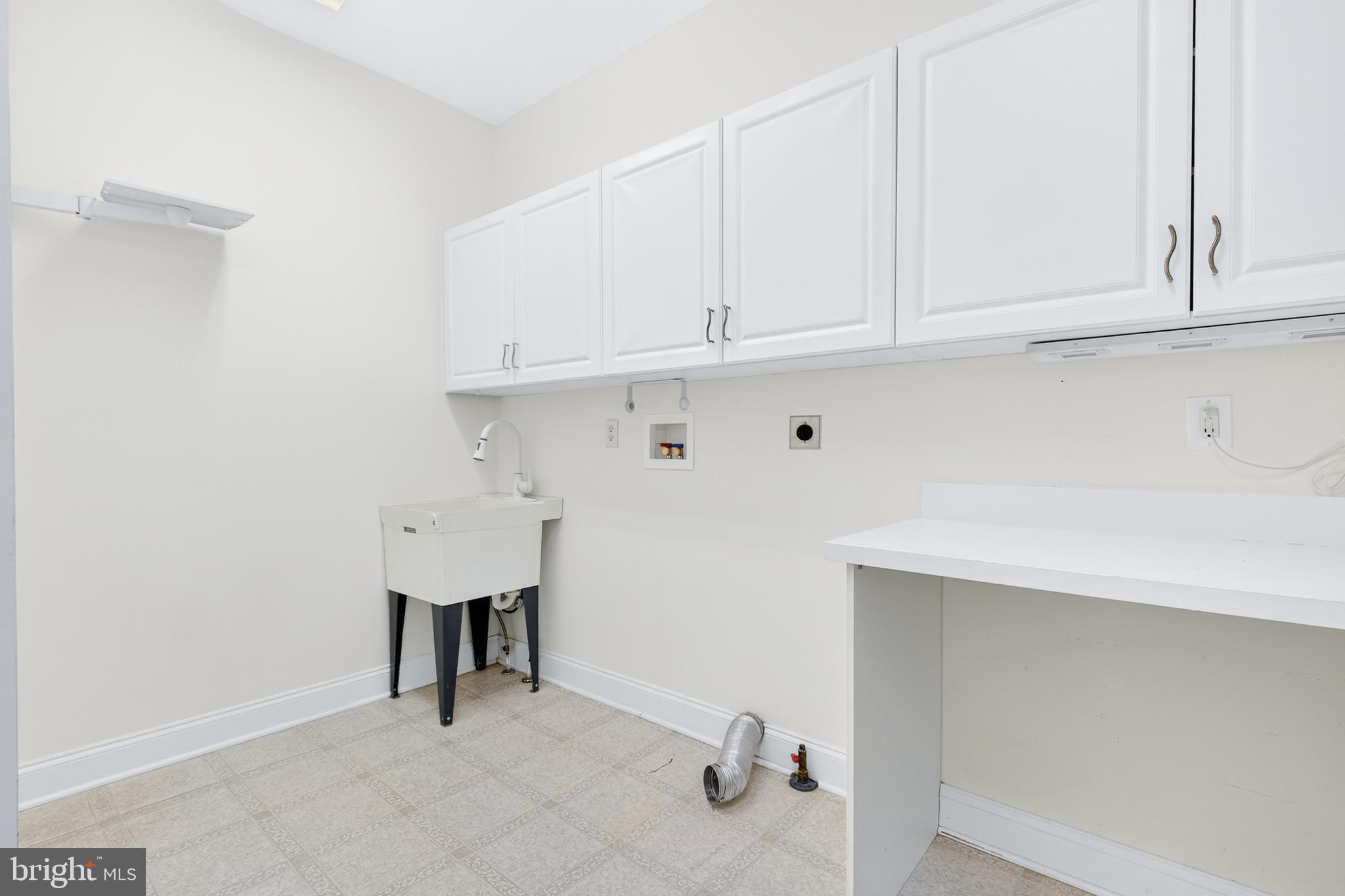 701 Woodfield Drive Lititz, PA 17543 - Photo 20 of 45 a view of cabinets and utility room with closet