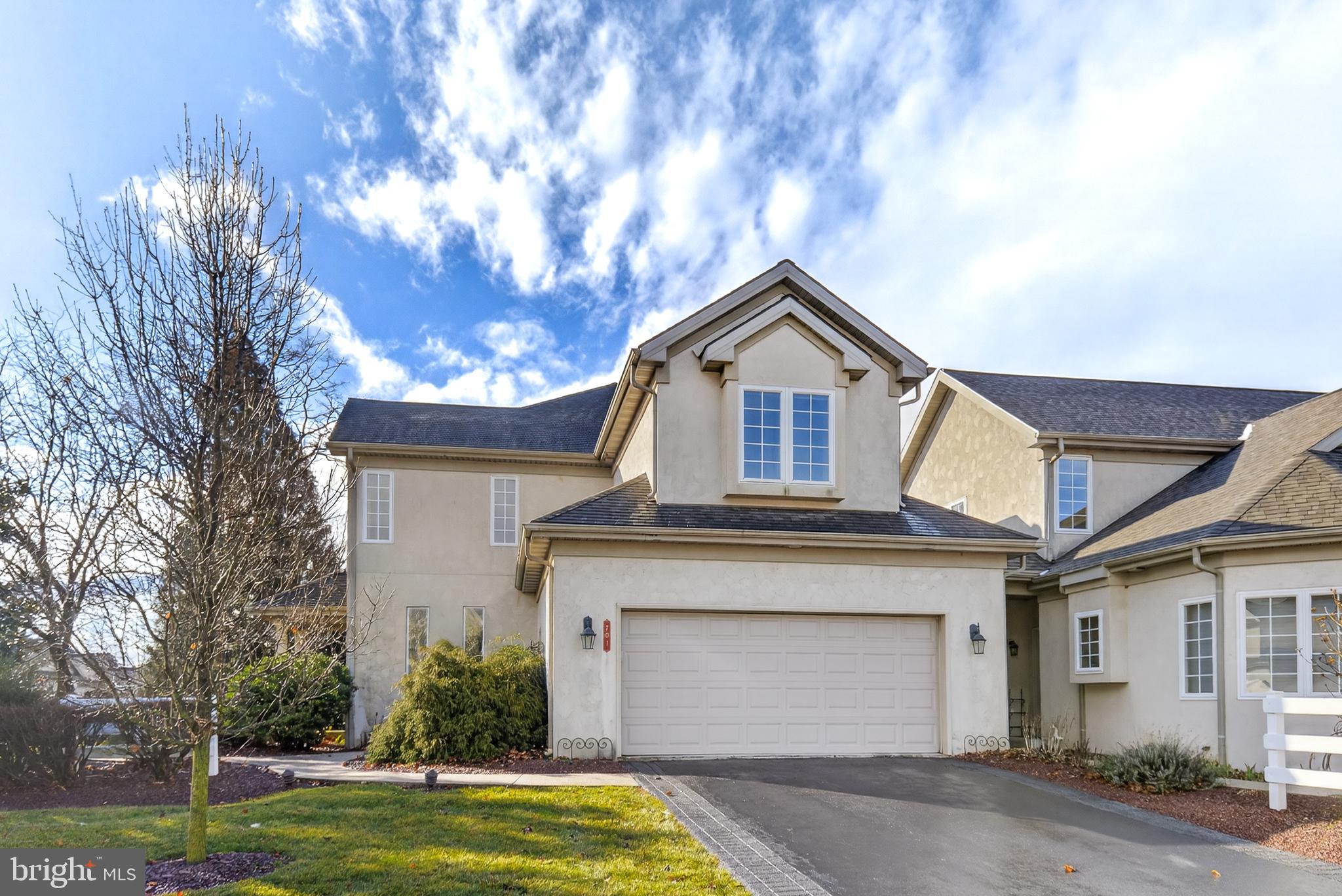 701 Woodfield Drive Lititz, PA 17543 - Photo 2 of 45 a front view of a house with garden