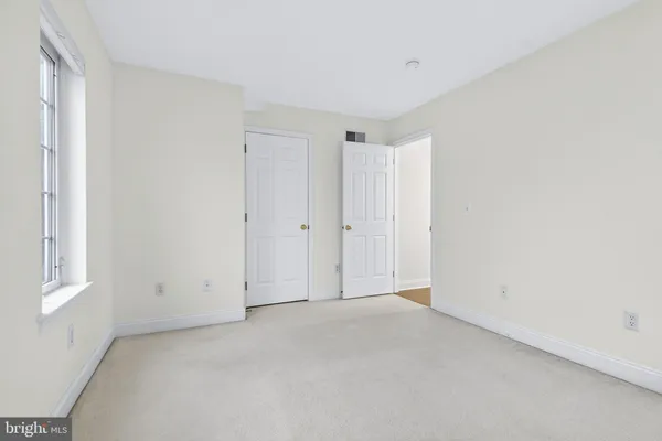 a view of a living room and kitchen with granite countertop kitchen view