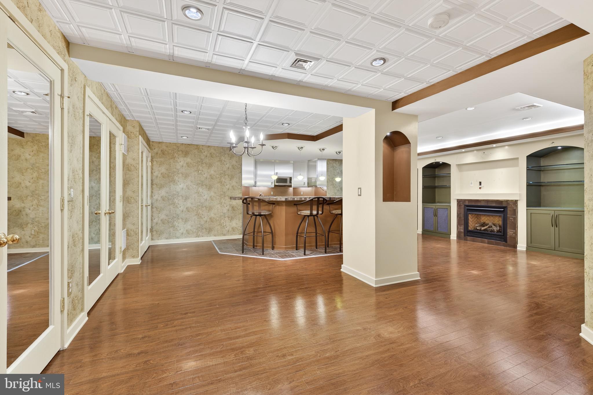 701 Woodfield Drive Lititz, PA 17543 - Photo 36 of 45 a view of a living room and kitchen with granite countertop kitchen view