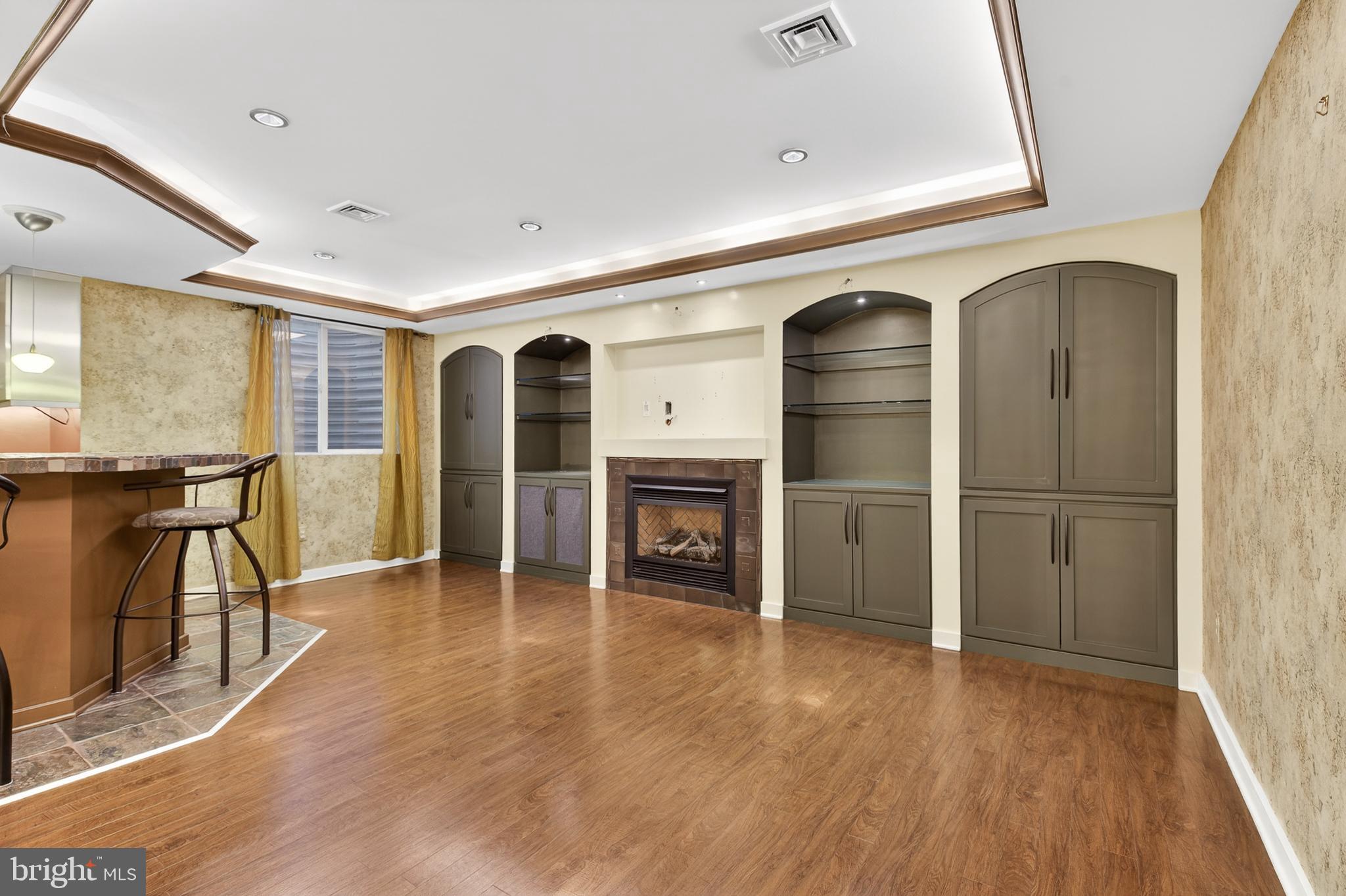 701 Woodfield Drive Lititz, PA 17543 - Photo 38 of 45 a view of a livingroom with a fireplace and window