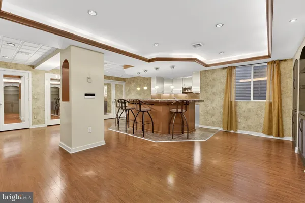 a kitchen with a table and chairs in it