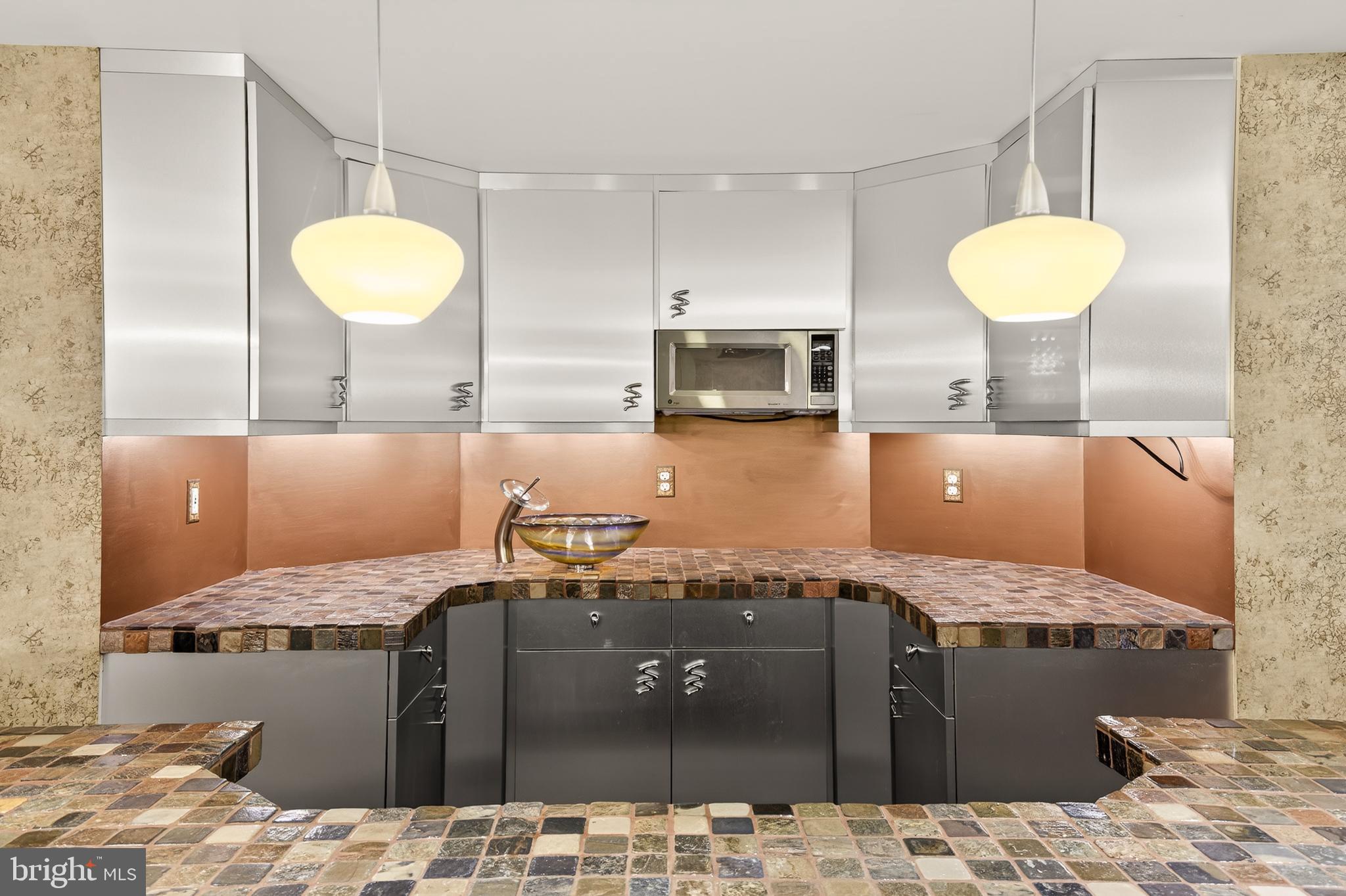 701 Woodfield Drive Lititz, PA 17543 - Photo 41 of 45 a kitchen with a table and chairs in it