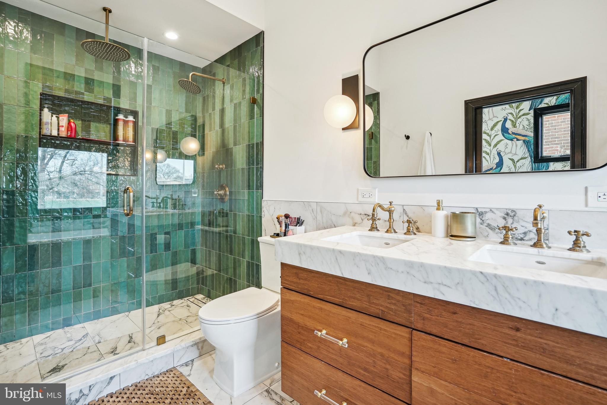 1235 E Street Southeast Washington, DC 20003 - Photo 15 of 43 a bathroom with a sink vanity granite toilet tub and shower