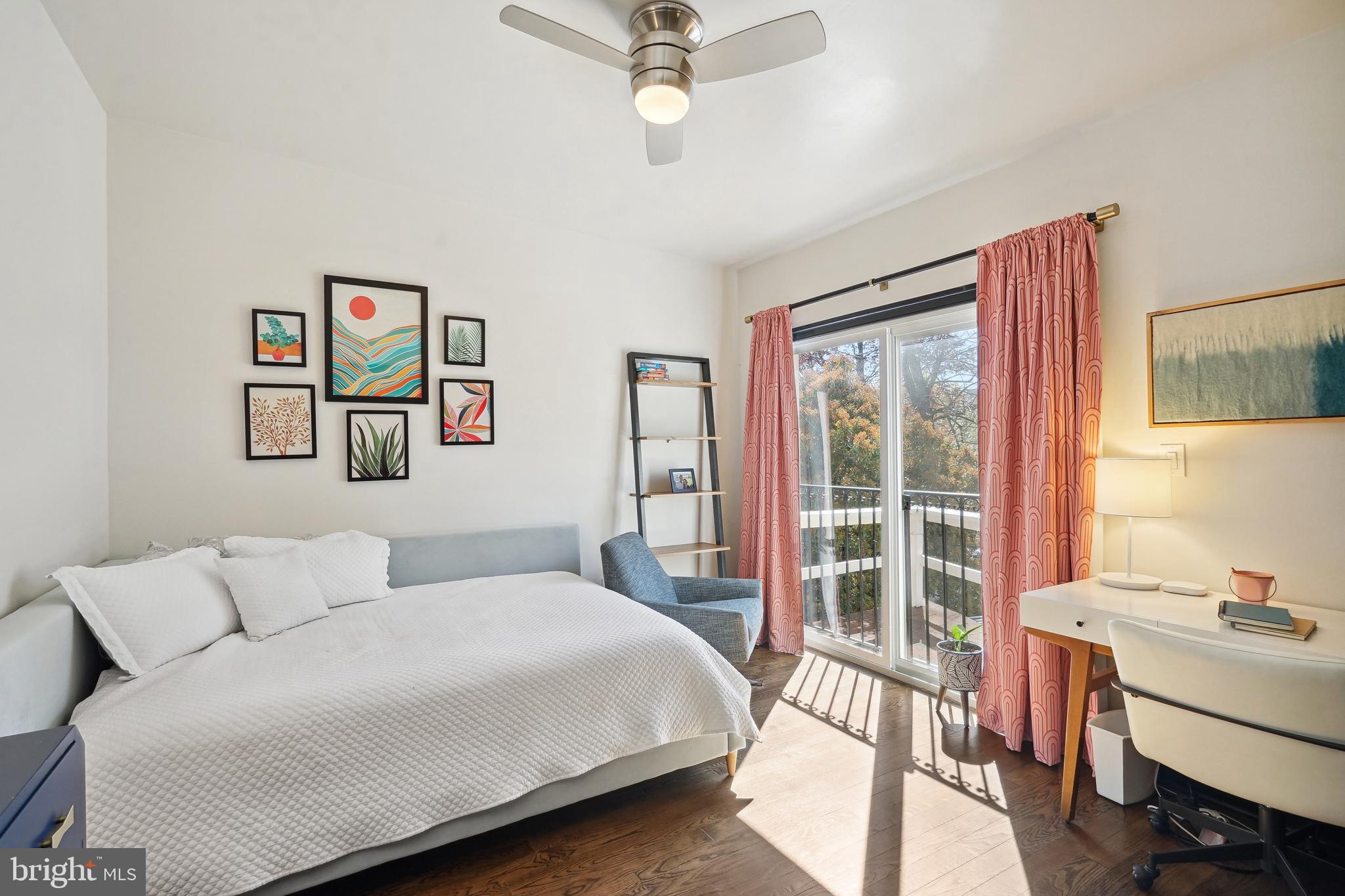 1235 E Street Southeast Washington, DC 20003 - Photo 17 of 43 a bedroom with a bed and a desk