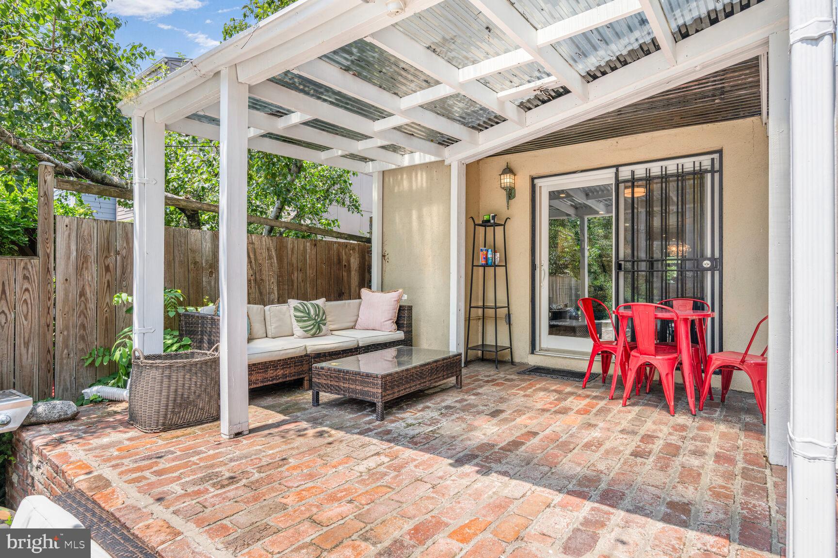 1235 E Street Southeast Washington, DC 20003 - Photo 22 of 43 a view of back yard with patio