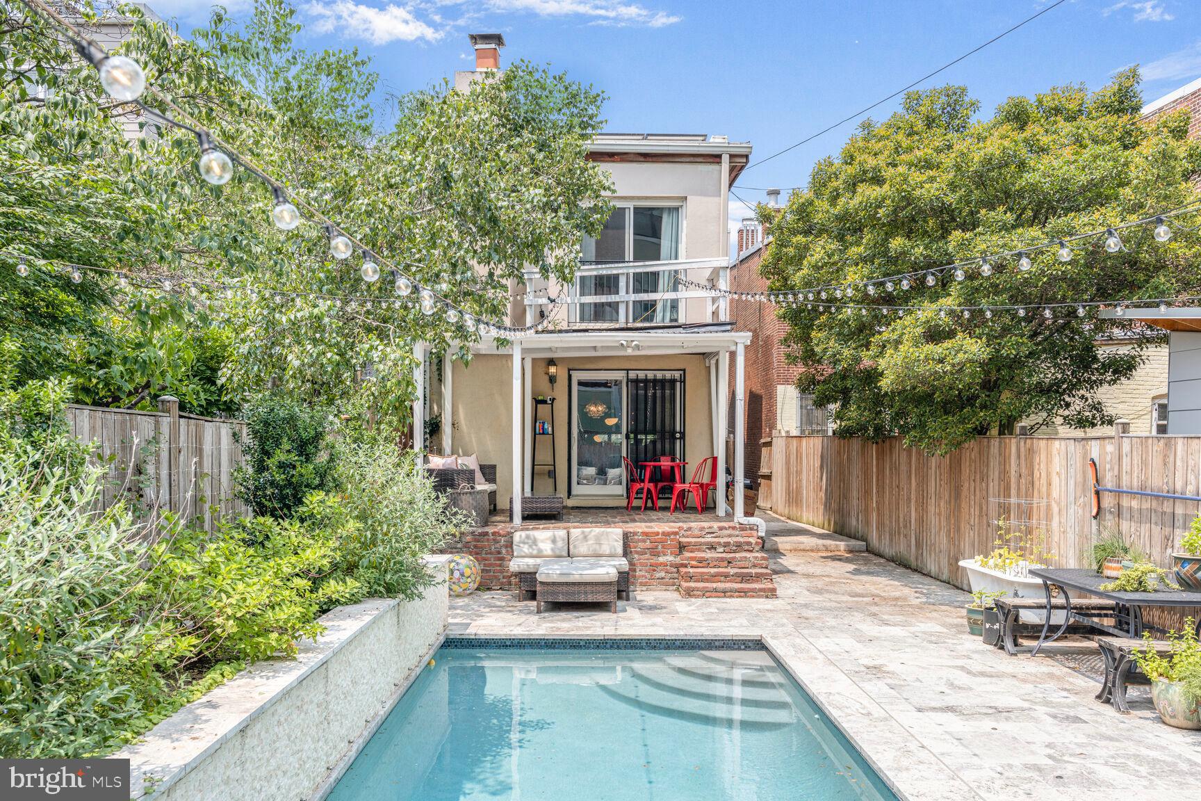 1235 E Street Southeast Washington, DC 20003 - Photo 23 of 43 a view of a house with sitting area and garden