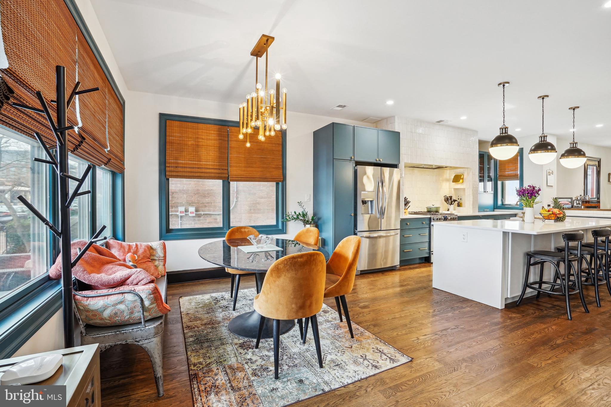 1235 E Street Southeast Washington, DC 20003 - Photo 3 of 43 a living room with dining room and kitchen view
