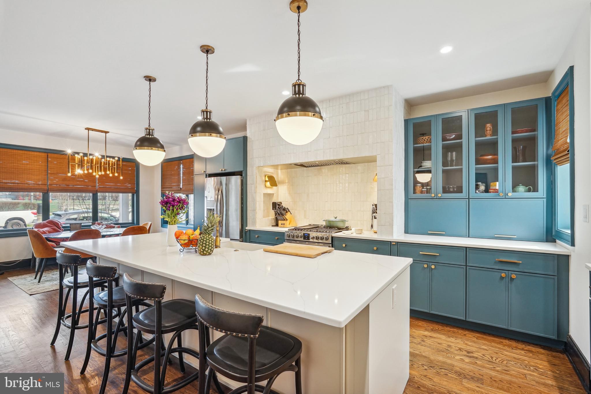 1235 E Street Southeast Washington, DC 20003 - Photo 7 of 43 a view of a dining table chairs and chandelier