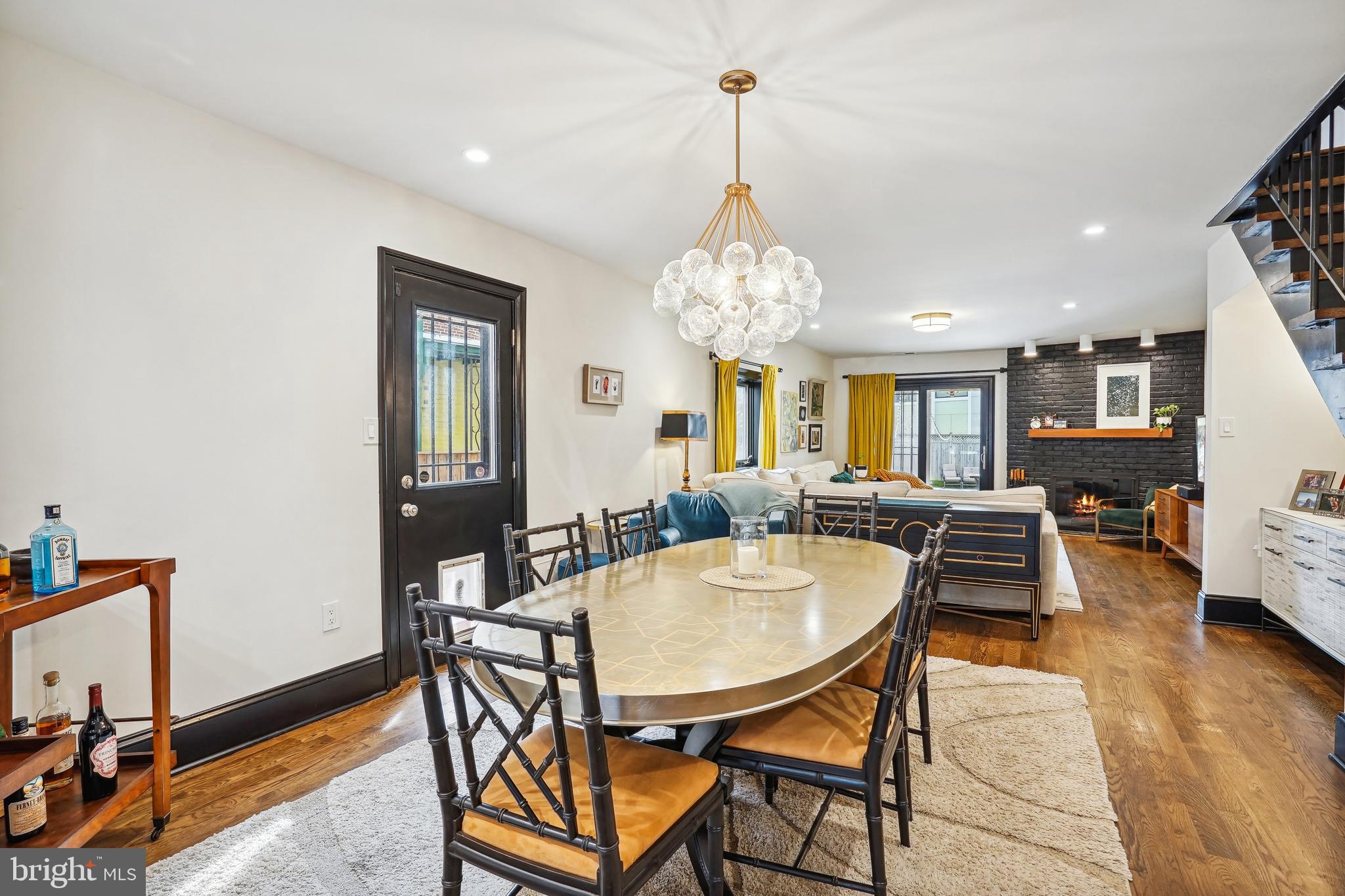 1235 E Street Southeast Washington, DC 20003 - Photo 8 of 43 a view of a dining room with furniture and wooden floor