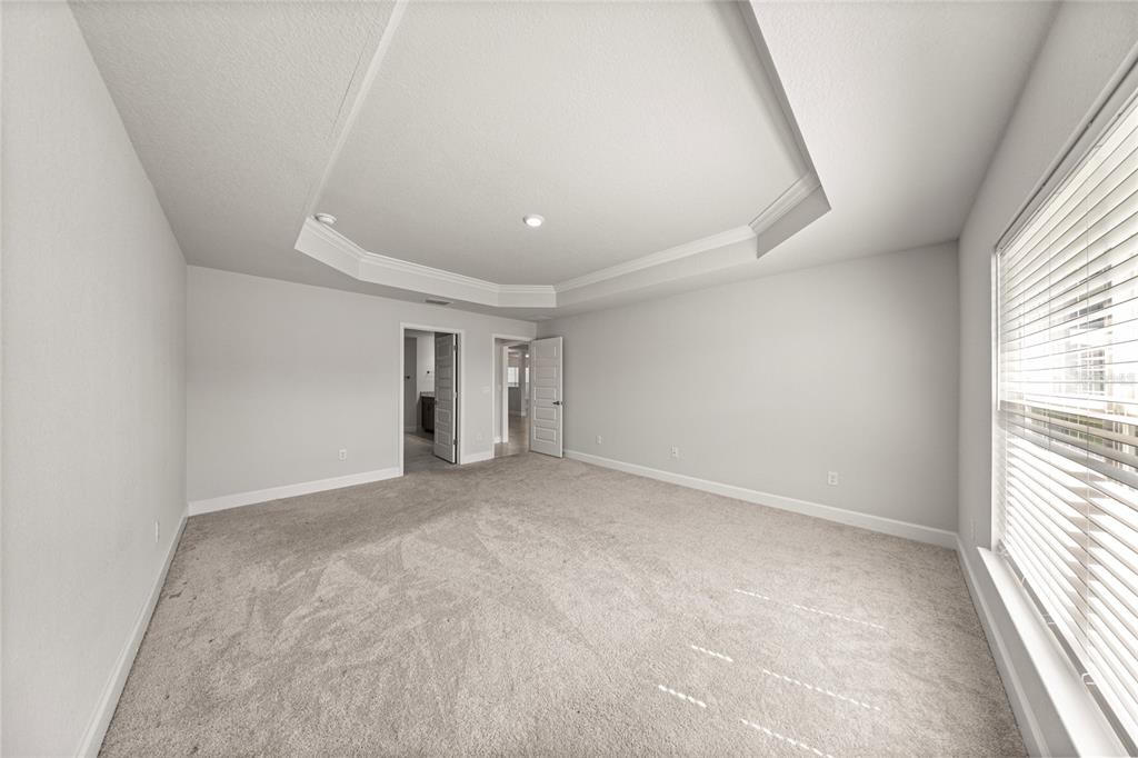 4984 Southwest 91st Place Ocala, FL 34476 - Photo 22 of 42 an empty room with a natural light