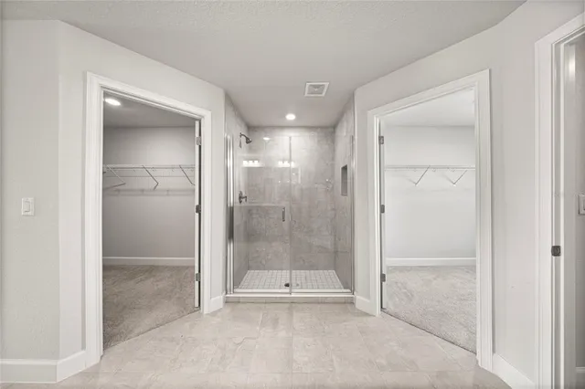 a view of a bathroom with shower
