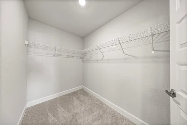 a view of a room with racks on the wall