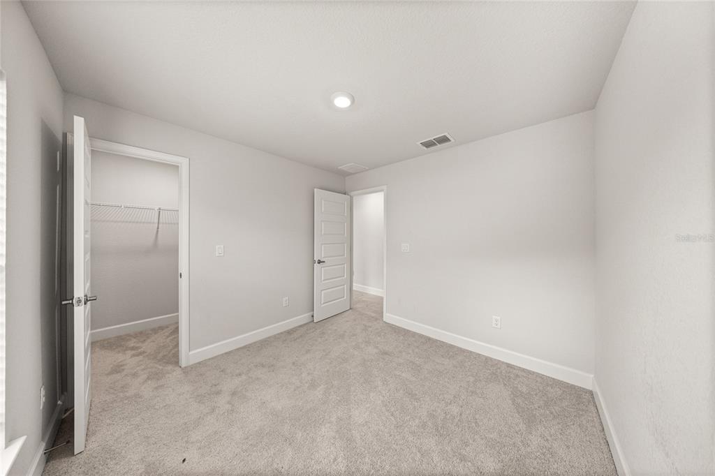 4984 Southwest 91st Place Ocala, FL 34476 - Photo 30 of 42 a view of an empty room