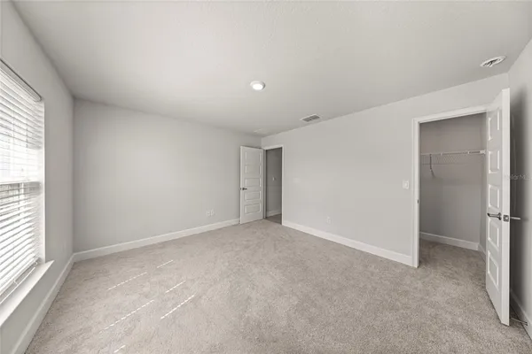 an empty room with a natural light