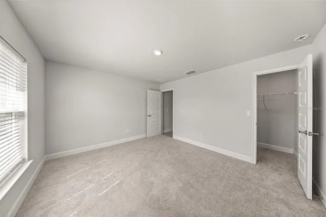 an empty room with a natural light