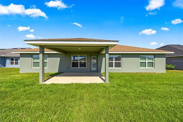 a view of a house with a garden