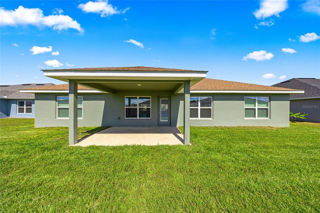 4984 Southwest 91st Place Ocala, FL 34476 - Photo 4 of 42 a view of a house with a garden