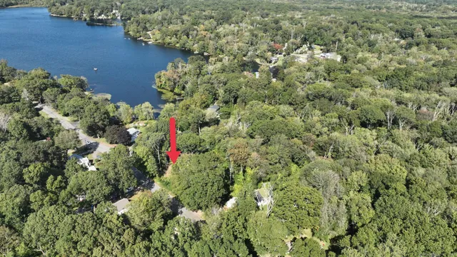 view of a lake with a building