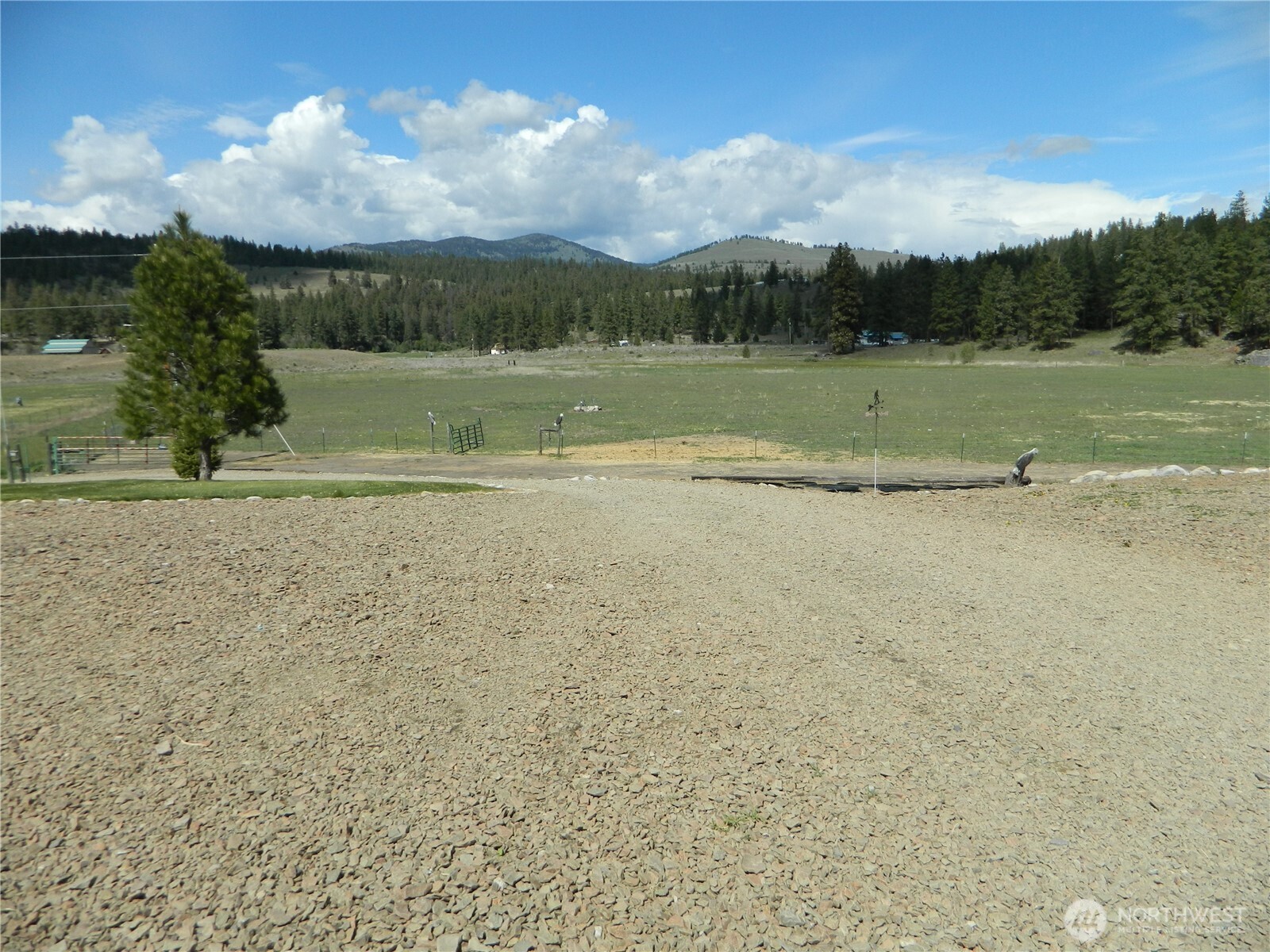 29 Duck Flats Road Tonasket, WA 98855 - Photo 7 of 25 a view of a lake with a big yard
