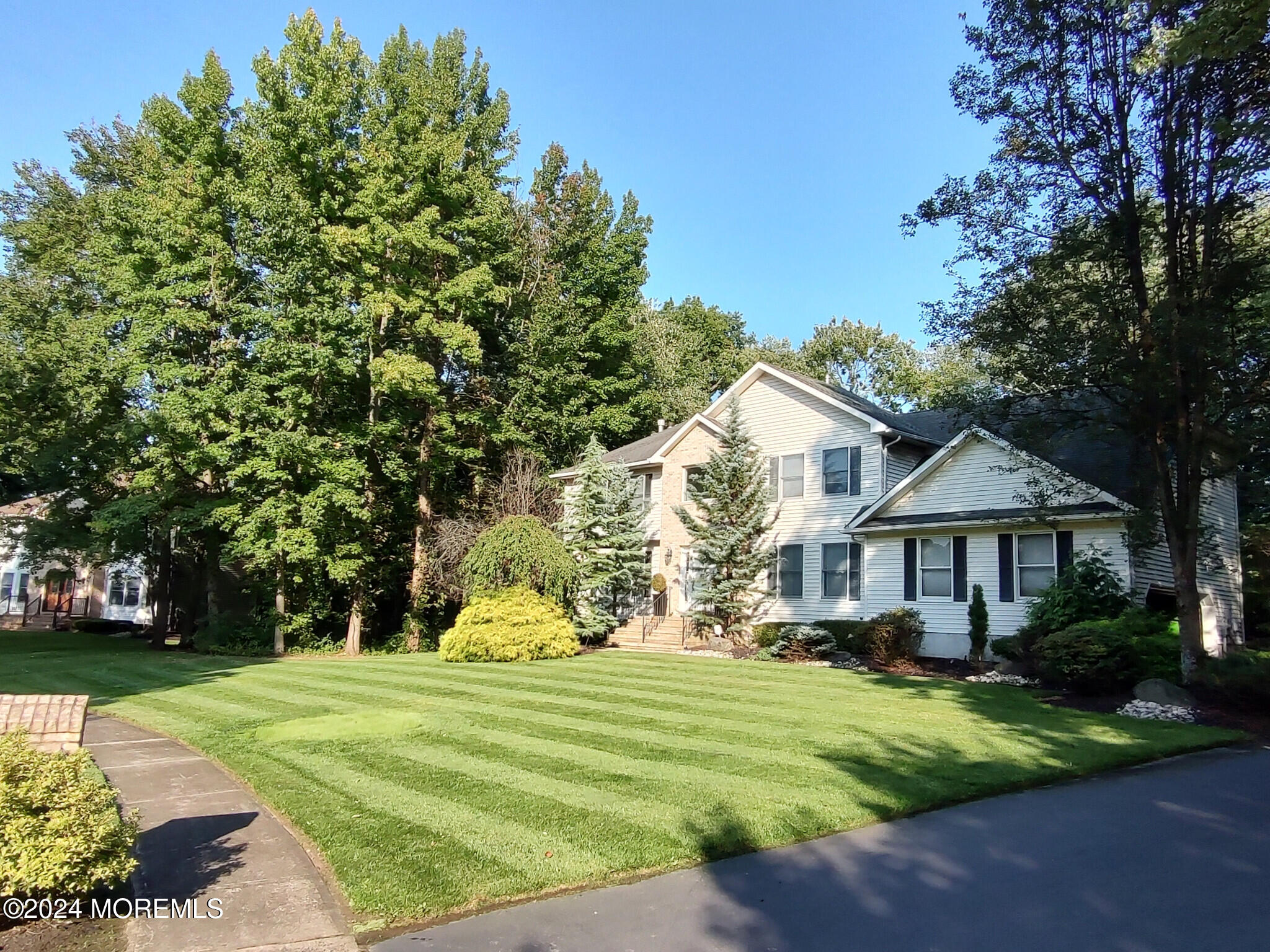3 Guinevere Road Monroe Township, NJ 08831 - Photo 1 of 2 a front view of a house with a yard