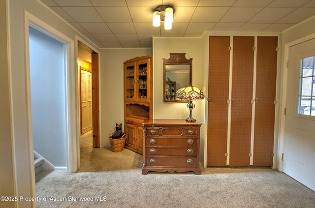 a view of walk in closet with window