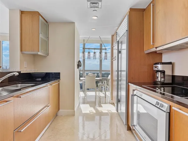 a bedroom with a bed and lamp