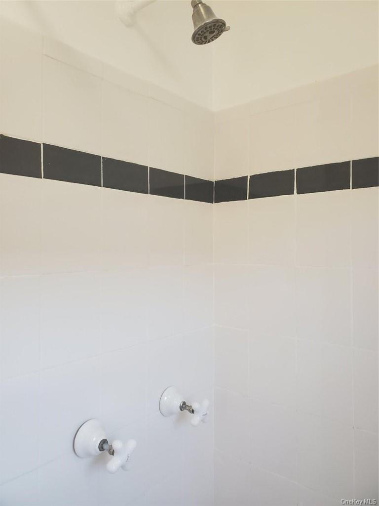 114 Lincoln Avenue, Unit 2 New Rochelle, NY 10801 - Photo 6 of 16 a bathroom with a shower