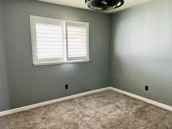 a view of a room that has a window