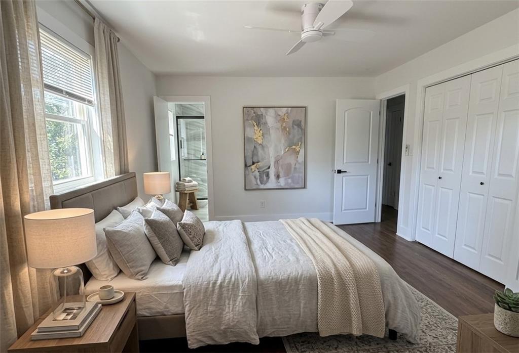 3763 Elkridge Drive Decatur, GA 30032 - Photo 9 of 20 a bedroom with a bed and wooden floor