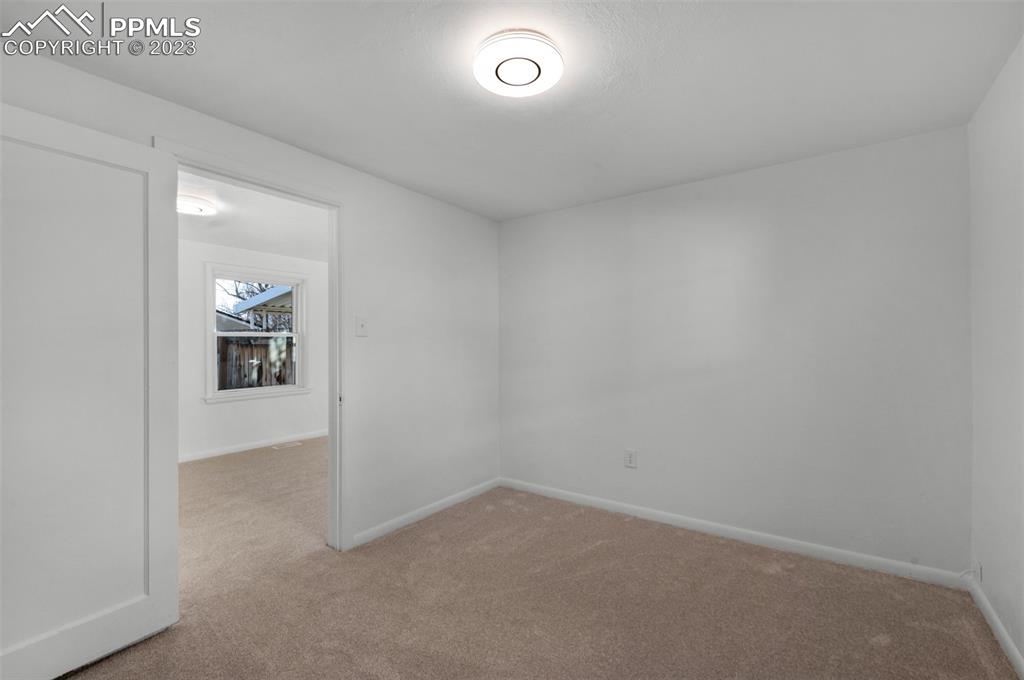 1007 Sunset Road Colorado Springs, CO 80909 - Photo 16 of 32 a view of an empty room