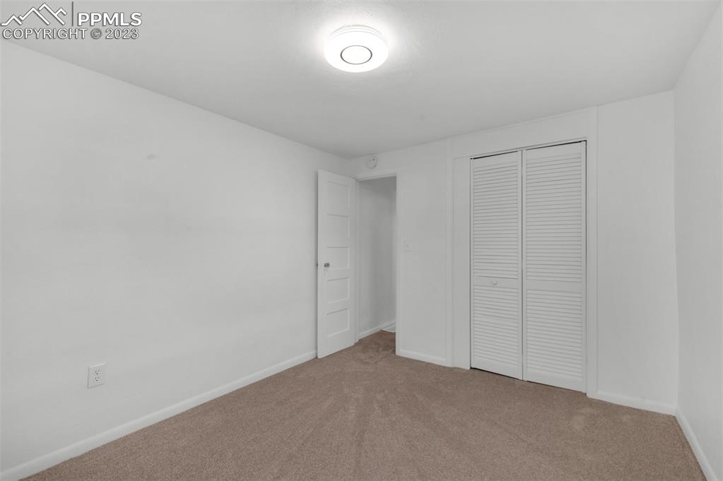 1007 Sunset Road Colorado Springs, CO 80909 - Photo 20 of 32 a view of an empty room