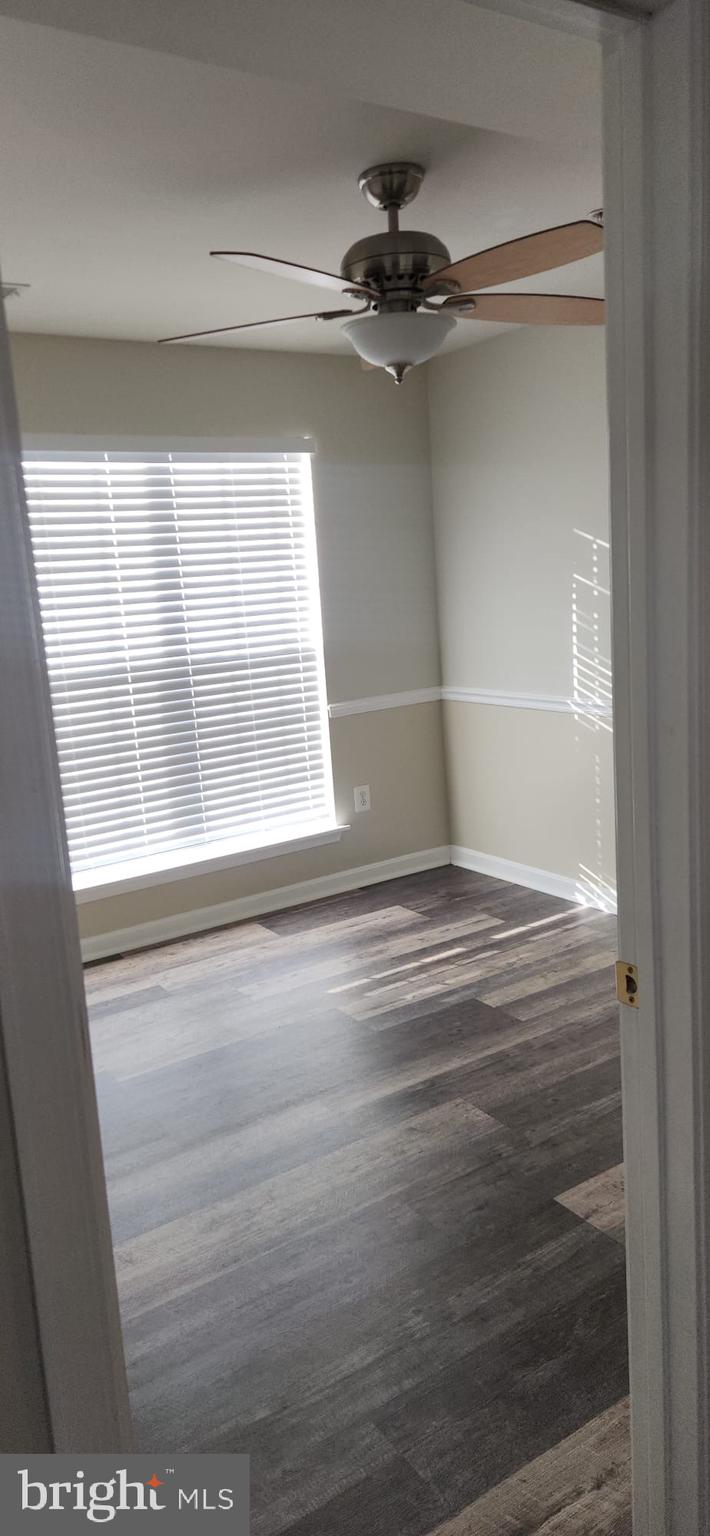 107 Swallow Pointe Court Frederick, MD 21702 - Photo 14 of 18 a view of empty room with window and ceiling fan