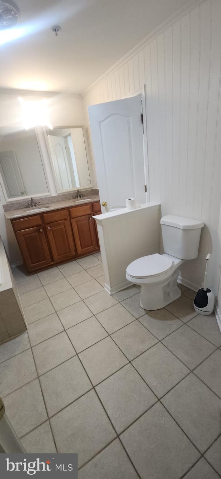 107 Swallow Pointe Court Frederick, MD 21702 - Photo 2 of 18 a bathroom with a sink and a toilet