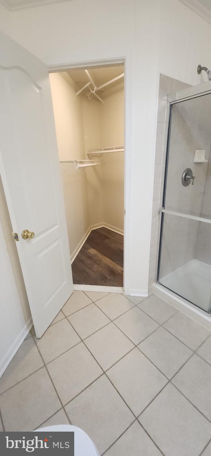 107 Swallow Pointe Court Frederick, MD 21702 - Photo 5 of 18 a view of an empty walk in closet