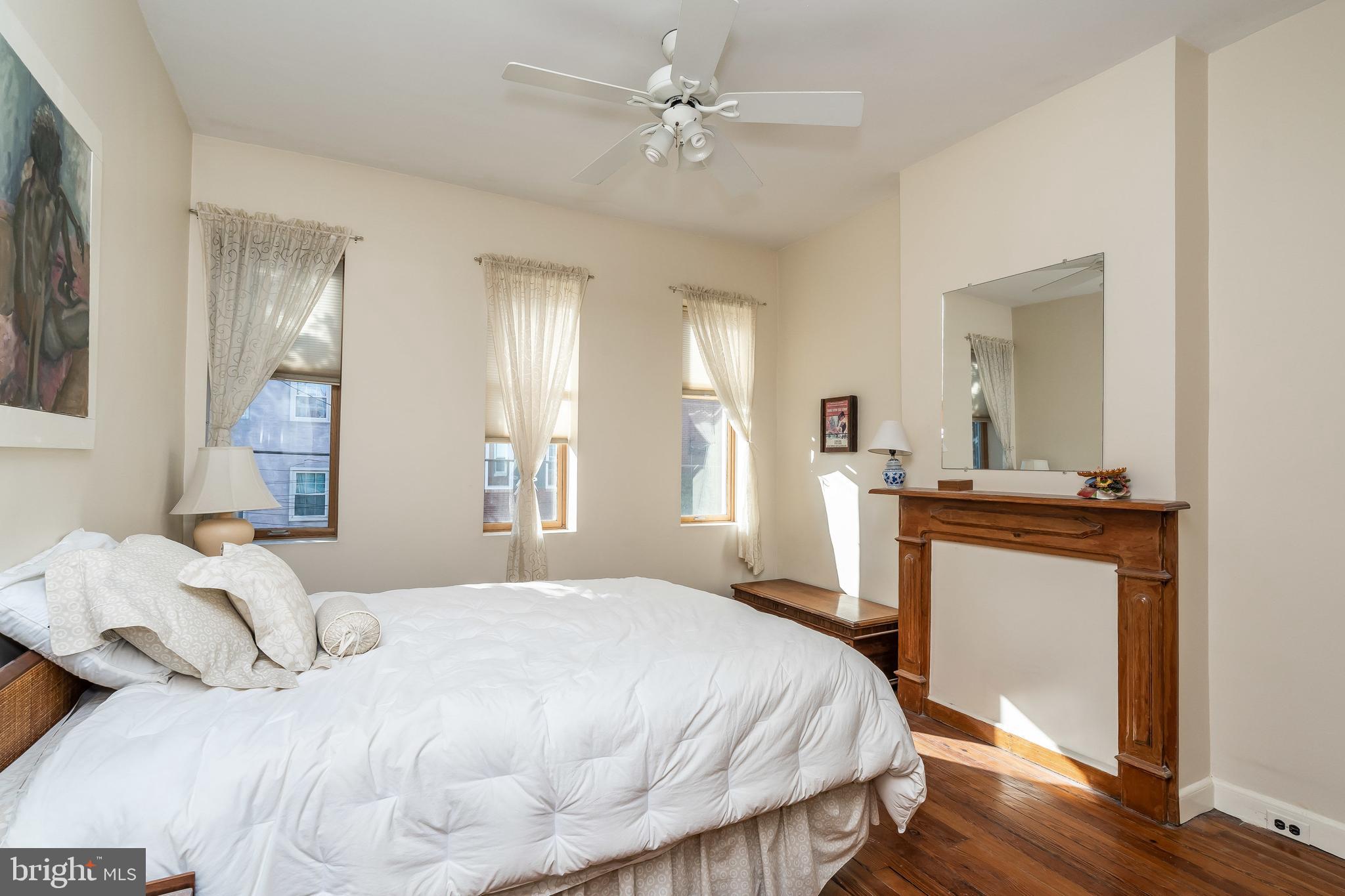 1047 Riverside Avenue Baltimore, MD 21230 - Photo 21 of 30 Decorative mantel and ceiling fan.